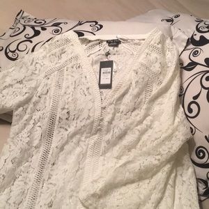 Lacy long sleeve white dress. NEVER WORN